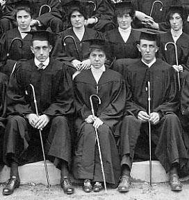students at Commencement with their canes