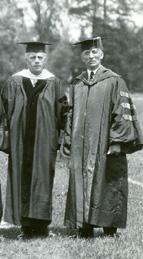 two men in robes at ceremony