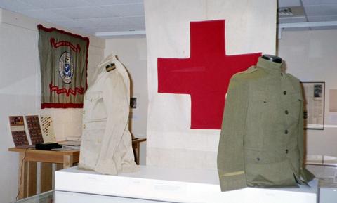 military uniforms and red cross banner in UH Museum