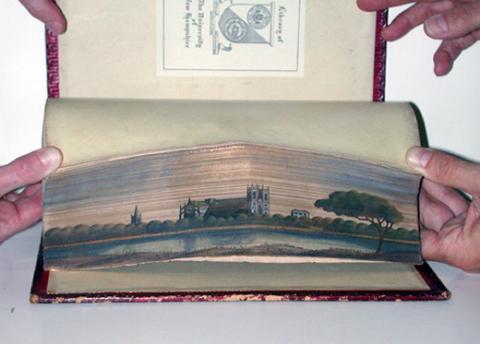 edge of book revealing fore-edge painting