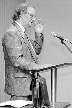 Donald Hall reading a podium