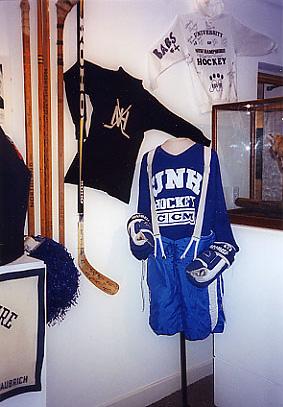 exhibit of unh hockey uniforms and equipment