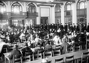 Commons interior, main dining hall at mealtime, 1922.