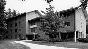 Jessie Doe Hall with tree in foreground.