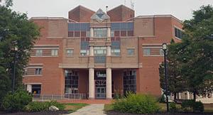 Entrance to Morse Hall from parking lot across the street, July 2016.