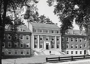 Nesmith Hall from Main Street with UNH water tank in background.