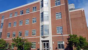 Main entrance to Rudman Hall taken from fire station, July 2016.