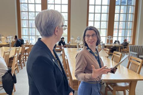 Kim Sweetman and Elizabeth Chilton talking in Dimond Library reading room