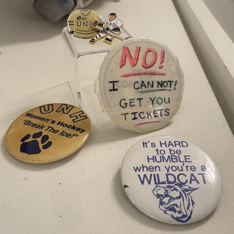 Old UNH pins from the athletics display